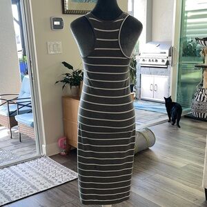 Striped Sleeveless racerback dress midi length. Has light stretchy fabric.